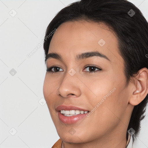 Joyful white young-adult female with medium  black hair and brown eyes