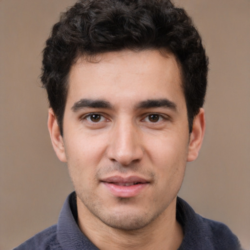 Neutral white young-adult male with short  black hair and brown eyes