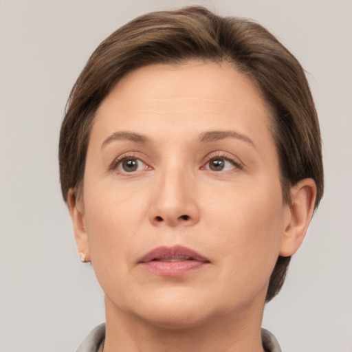 Neutral white adult female with short  brown hair and brown eyes