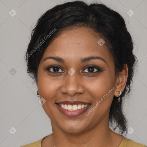 Joyful black young-adult female with medium  brown hair and brown eyes