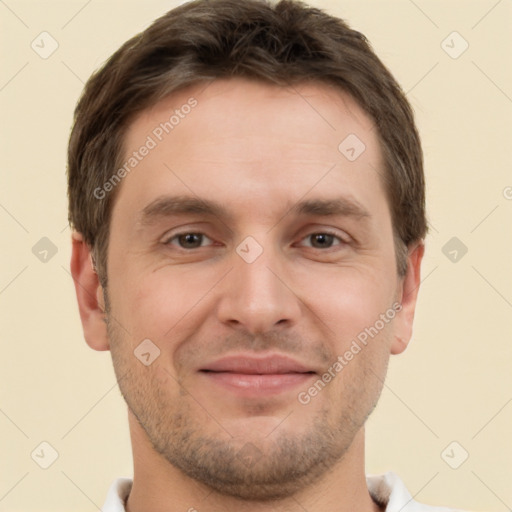 Joyful white adult male with short  brown hair and brown eyes