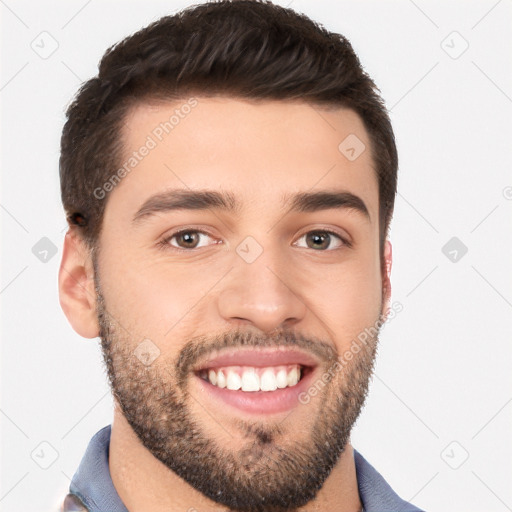 Joyful white young-adult male with short  black hair and brown eyes