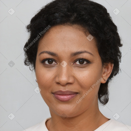 Joyful latino young-adult female with short  black hair and brown eyes