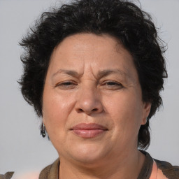 Joyful white middle-aged female with short  brown hair and brown eyes