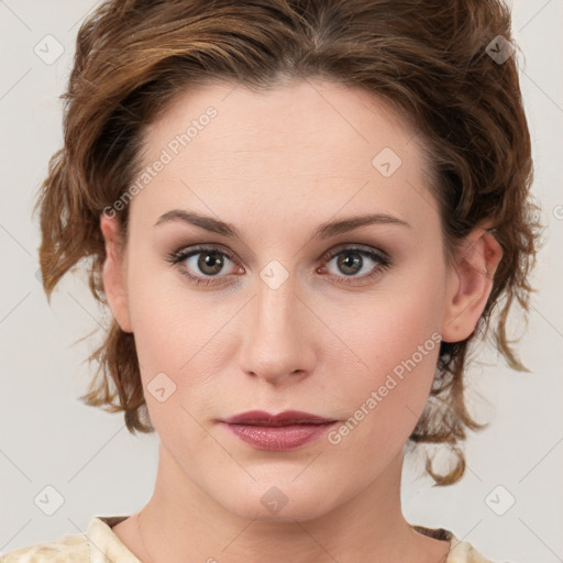 Neutral white young-adult female with medium  brown hair and green eyes