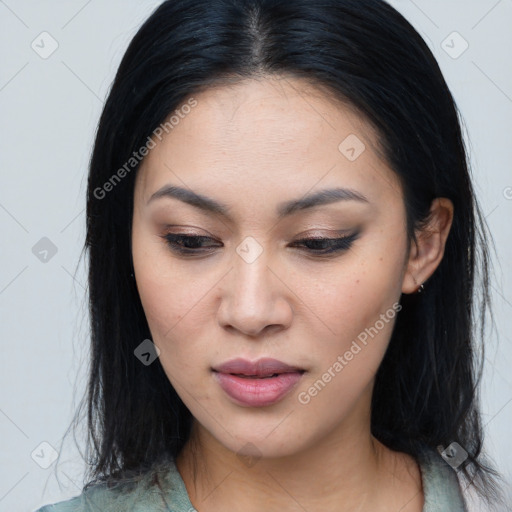 Joyful asian young-adult female with long  brown hair and brown eyes