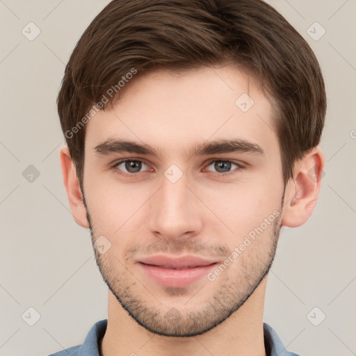 Neutral white young-adult male with short  brown hair and brown eyes