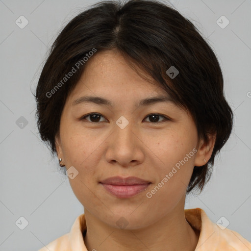 Joyful asian adult female with medium  brown hair and brown eyes