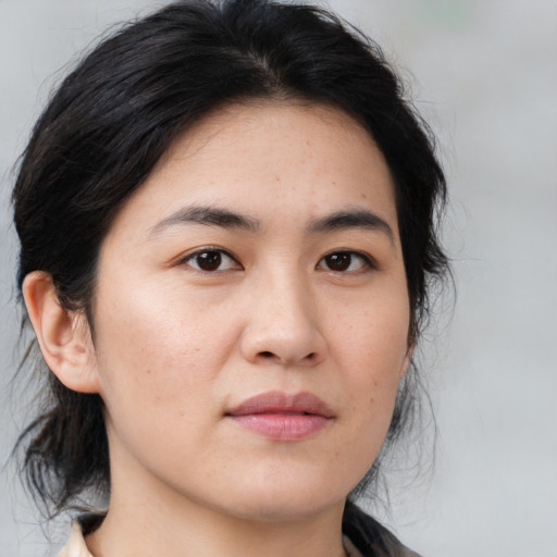 Neutral asian young-adult female with medium  brown hair and brown eyes