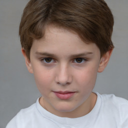 Joyful white child female with short  brown hair and brown eyes