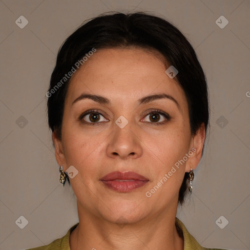 Joyful white adult female with medium  brown hair and brown eyes