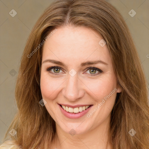 Joyful white young-adult female with long  brown hair and green eyes