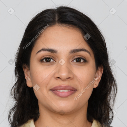 Joyful latino young-adult female with medium  brown hair and brown eyes