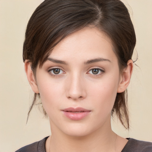 Neutral white young-adult female with medium  brown hair and brown eyes