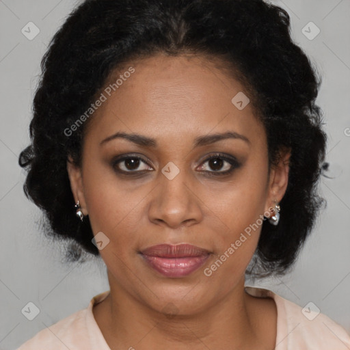 Joyful latino adult female with medium  brown hair and brown eyes