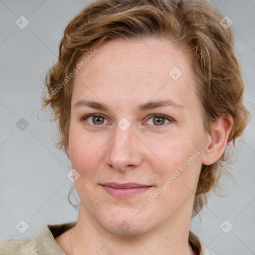 Joyful white young-adult female with medium  brown hair and blue eyes