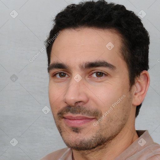 Joyful white young-adult male with short  black hair and brown eyes