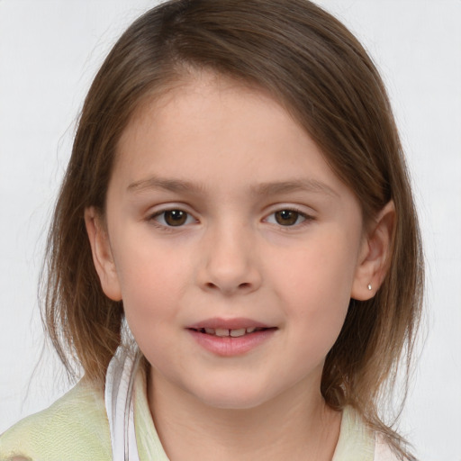 Joyful white child female with medium  brown hair and brown eyes