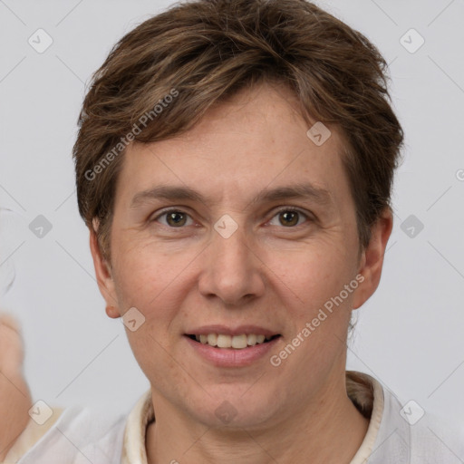 Joyful white adult female with short  brown hair and grey eyes