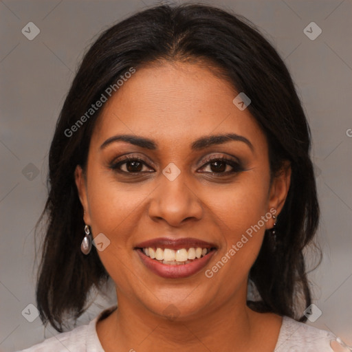 Joyful latino young-adult female with medium  brown hair and brown eyes