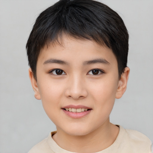 Joyful asian child female with short  brown hair and brown eyes