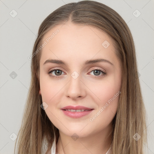 Joyful white young-adult female with long  brown hair and grey eyes