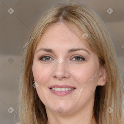 Joyful white adult female with long  brown hair and brown eyes