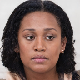 Neutral black young-adult female with long  brown hair and brown eyes