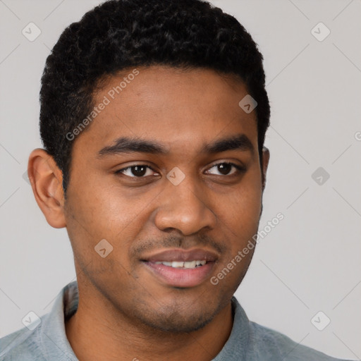 Joyful black young-adult male with short  black hair and brown eyes