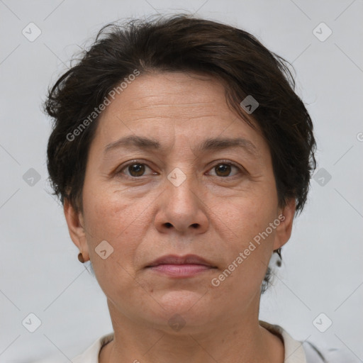 Joyful white adult female with short  brown hair and brown eyes