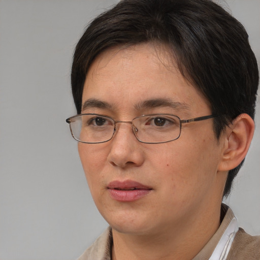 Neutral white adult female with short  brown hair and brown eyes