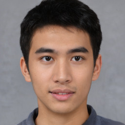 Neutral asian young-adult male with short  brown hair and brown eyes