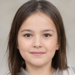 Joyful white child female with medium  brown hair and brown eyes