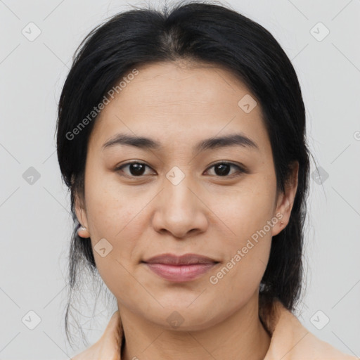 Joyful asian young-adult female with medium  black hair and brown eyes