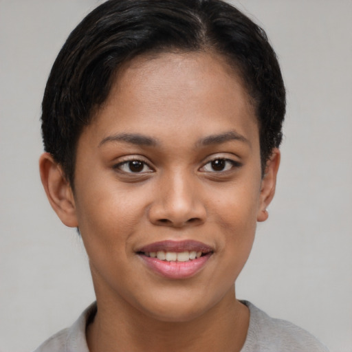 Joyful asian young-adult female with short  brown hair and brown eyes