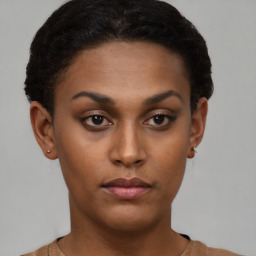 Neutral black young-adult female with short  brown hair and brown eyes