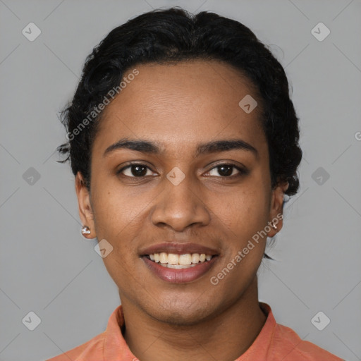 Joyful black young-adult female with short  black hair and brown eyes