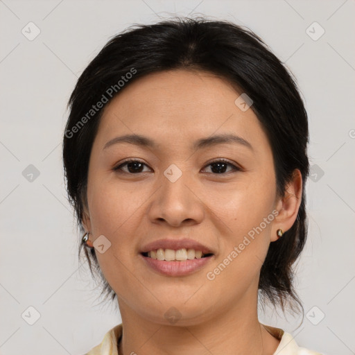 Joyful asian young-adult female with medium  brown hair and brown eyes