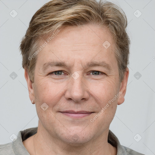 Joyful white adult male with short  brown hair and grey eyes