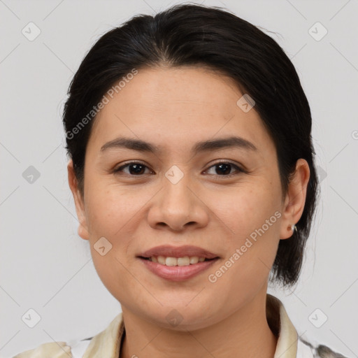 Joyful asian young-adult female with medium  brown hair and brown eyes