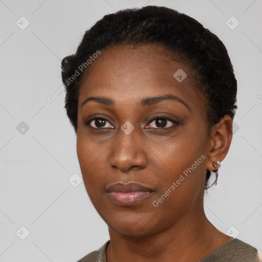 Neutral black young-adult female with short  black hair and brown eyes