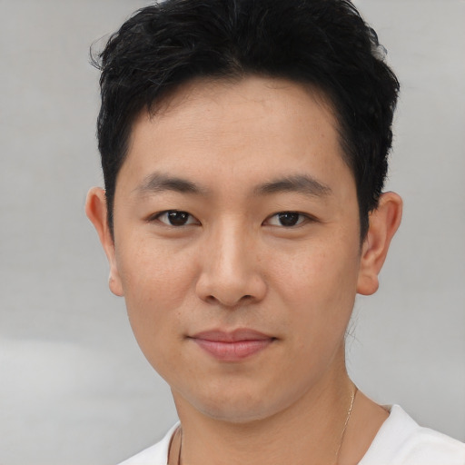 Neutral asian young-adult male with short  black hair and brown eyes