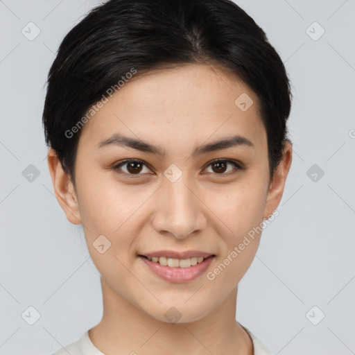 Joyful asian young-adult female with short  brown hair and brown eyes