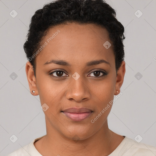 Joyful black young-adult female with short  brown hair and brown eyes