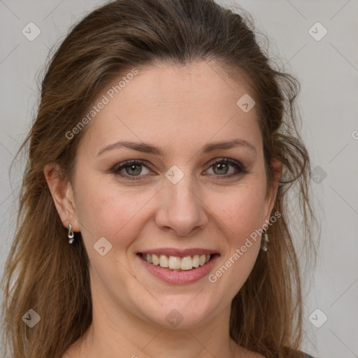 Joyful white young-adult female with long  brown hair and grey eyes