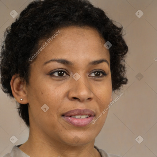 Joyful black adult female with short  brown hair and brown eyes