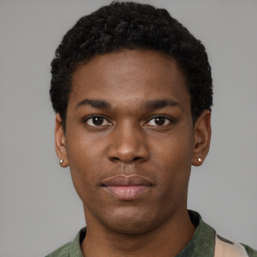 Neutral black young-adult male with short  black hair and brown eyes