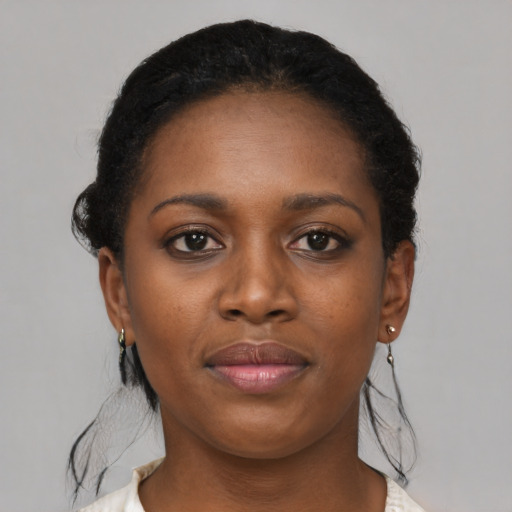Neutral black young-adult female with medium  black hair and brown eyes