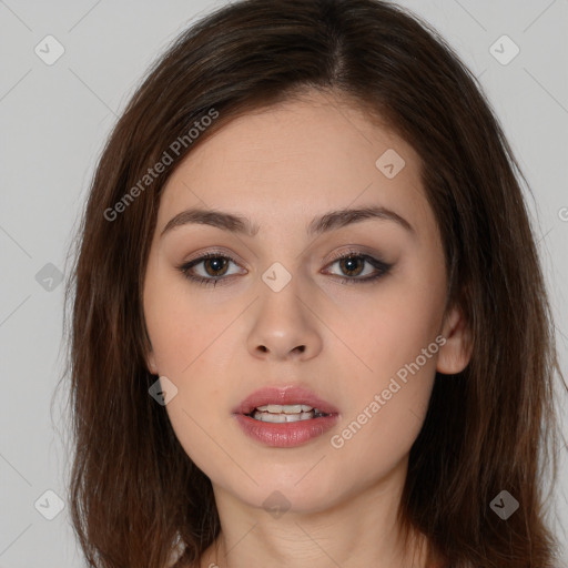 Neutral white young-adult female with long  brown hair and brown eyes