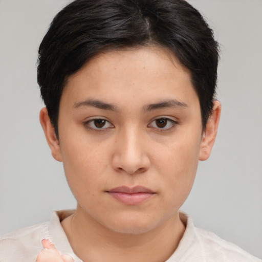 Neutral white young-adult female with short  brown hair and brown eyes